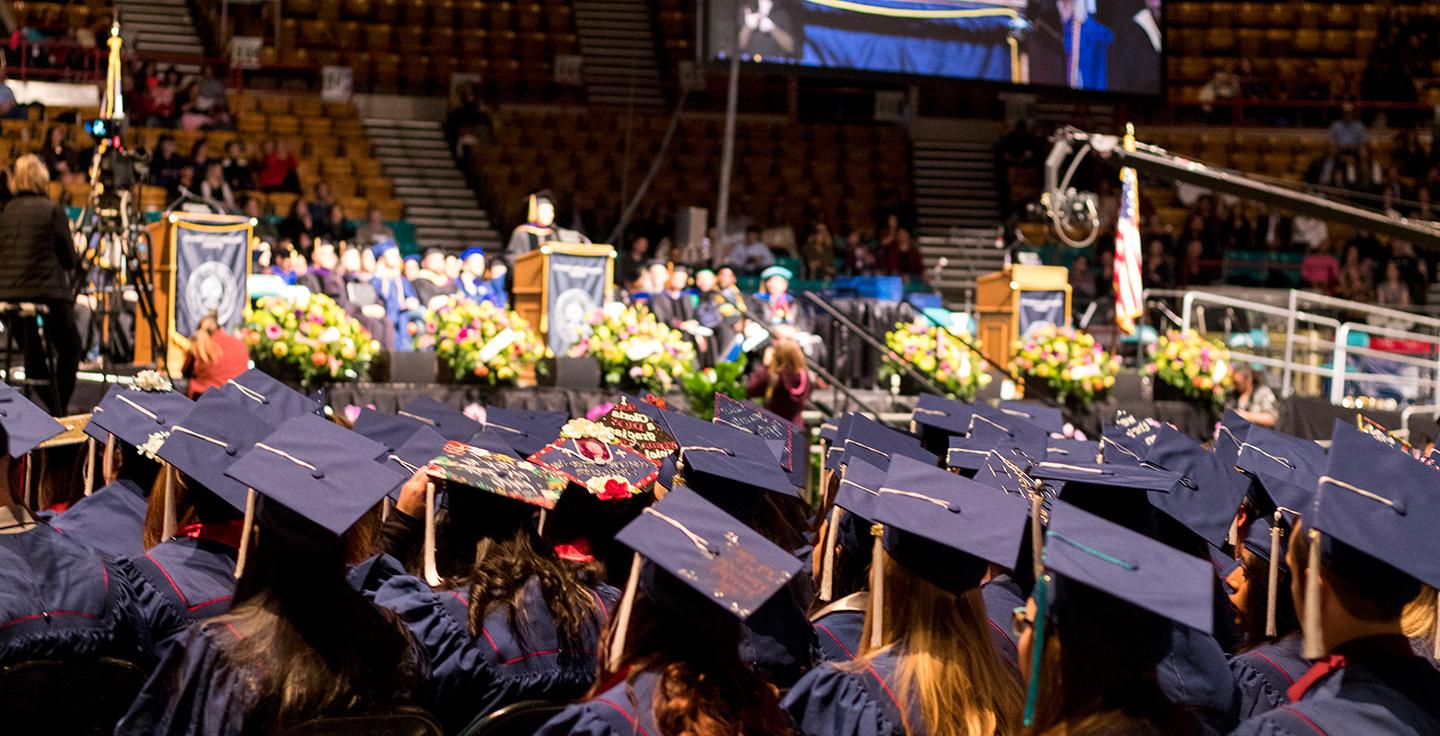 Commencement ceremony photo of the students caps.